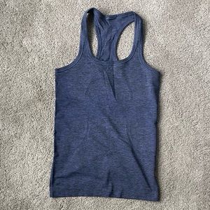 Lululemon Purple/black size 4 swiftly.